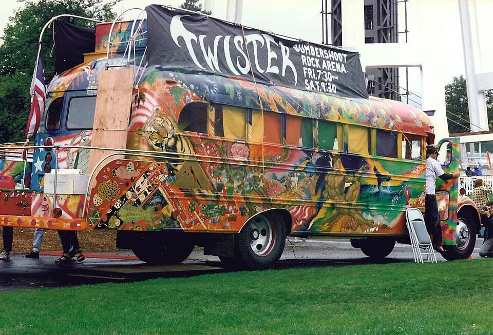 Ken Kesey - "Further" / "Furthur", Ken Kesey and the Merry Pranksters' famous bus, Bumbershoot festival, Seattle, Washington, 1994. This is the second of the two buses by this name. "Twister" was Kese