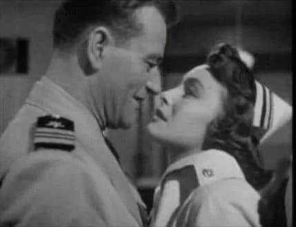 Patricia Neal - Screenshot of Patricia Neal and John Wayne from the film Operation Pacific