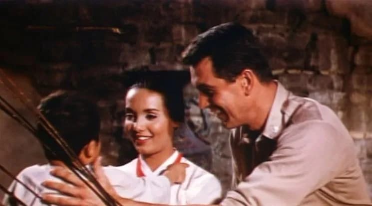 Rock Hudson - Anna Kashfi and Rock Hudson in Battle Hymn (1957) - trailer (cropped screenshot)