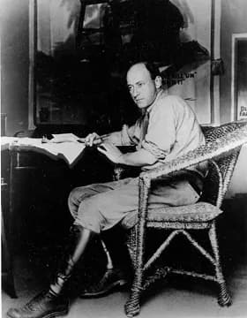 Cecil B. DeMille - Cecil B. DeMille. Behind him: the poster of The Squaw Man (1914) (according to John Douglas Eames in Paramount Story, Littlehampton Book Services Ltd, 1985)