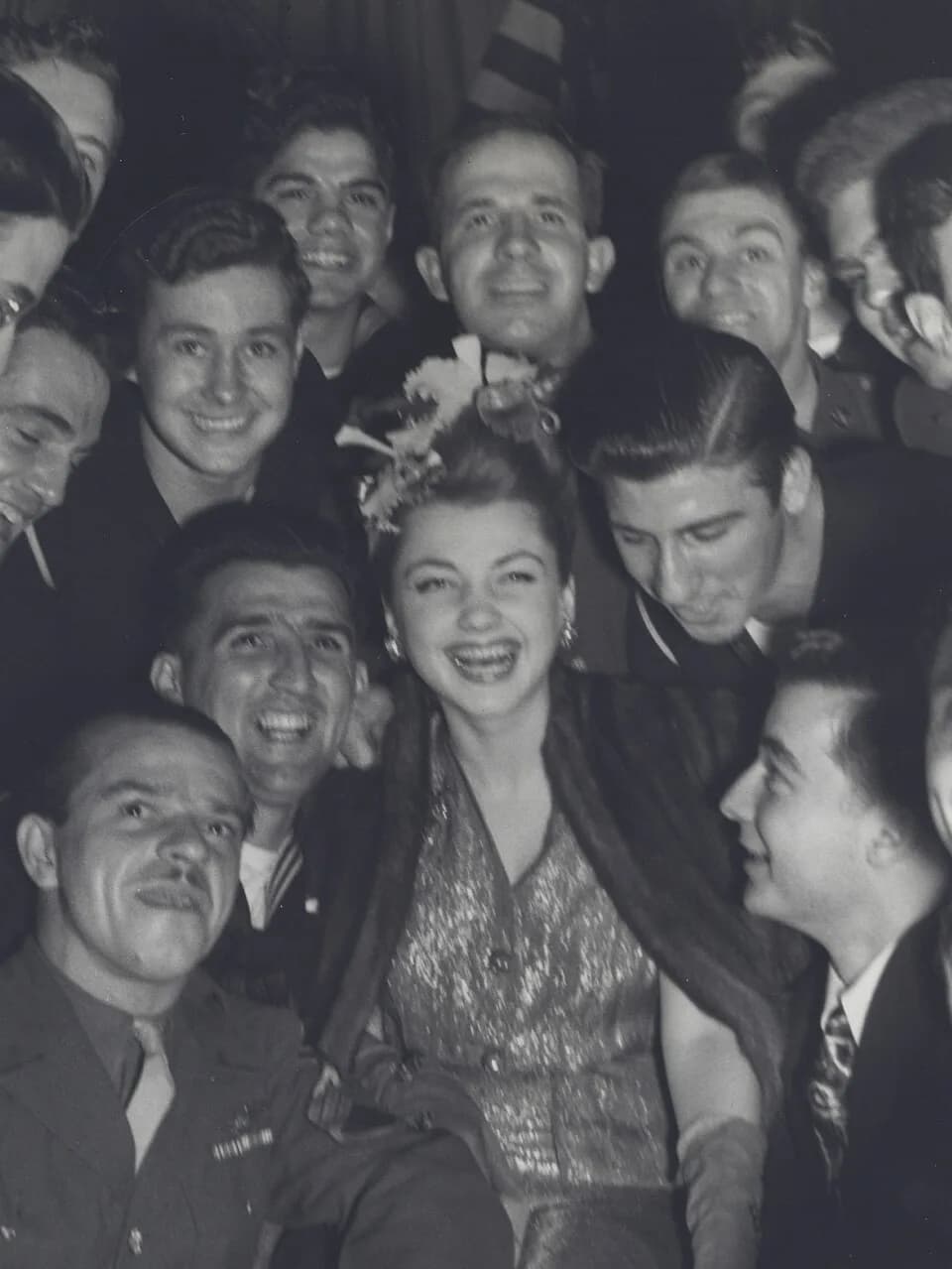 Anne Baxter - Anne Baxter in 1943 pose with United States Army soldiers
Photograph by the U.S. Army Signal Corps