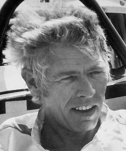 James Coburn - Photo of Bob Bondurant teaching actor James Coburn how to drive a race car.