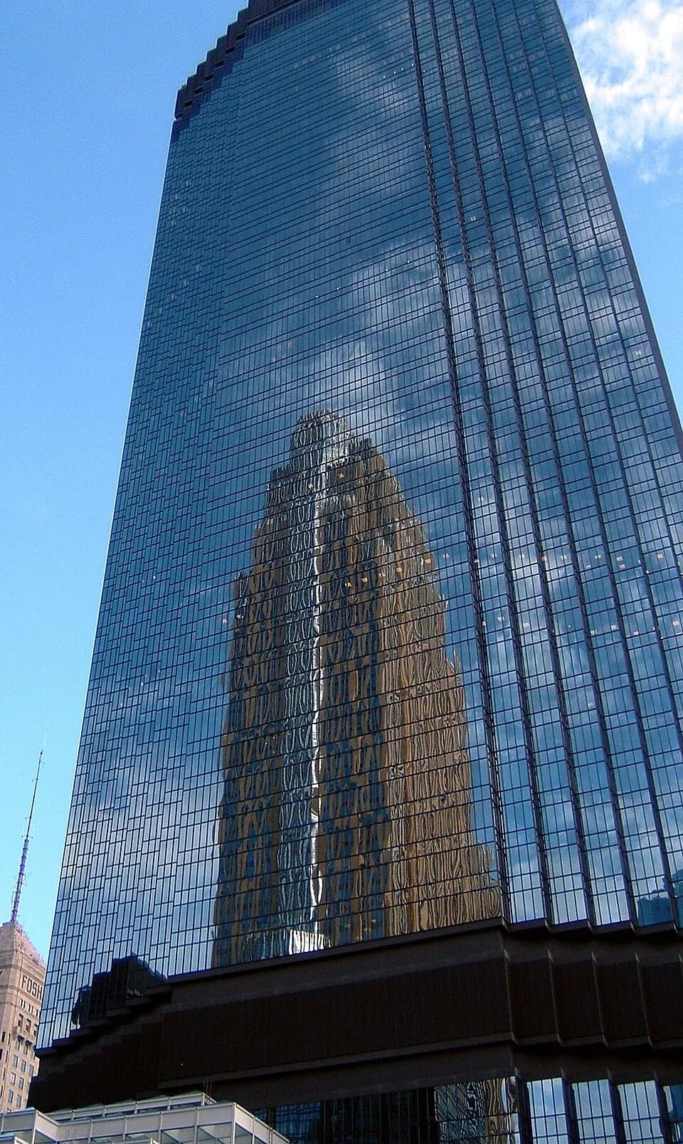 Philip Johnson - IDS Center in Minneapolis, Minnesota reflecting the nearby Wells Fargo Center