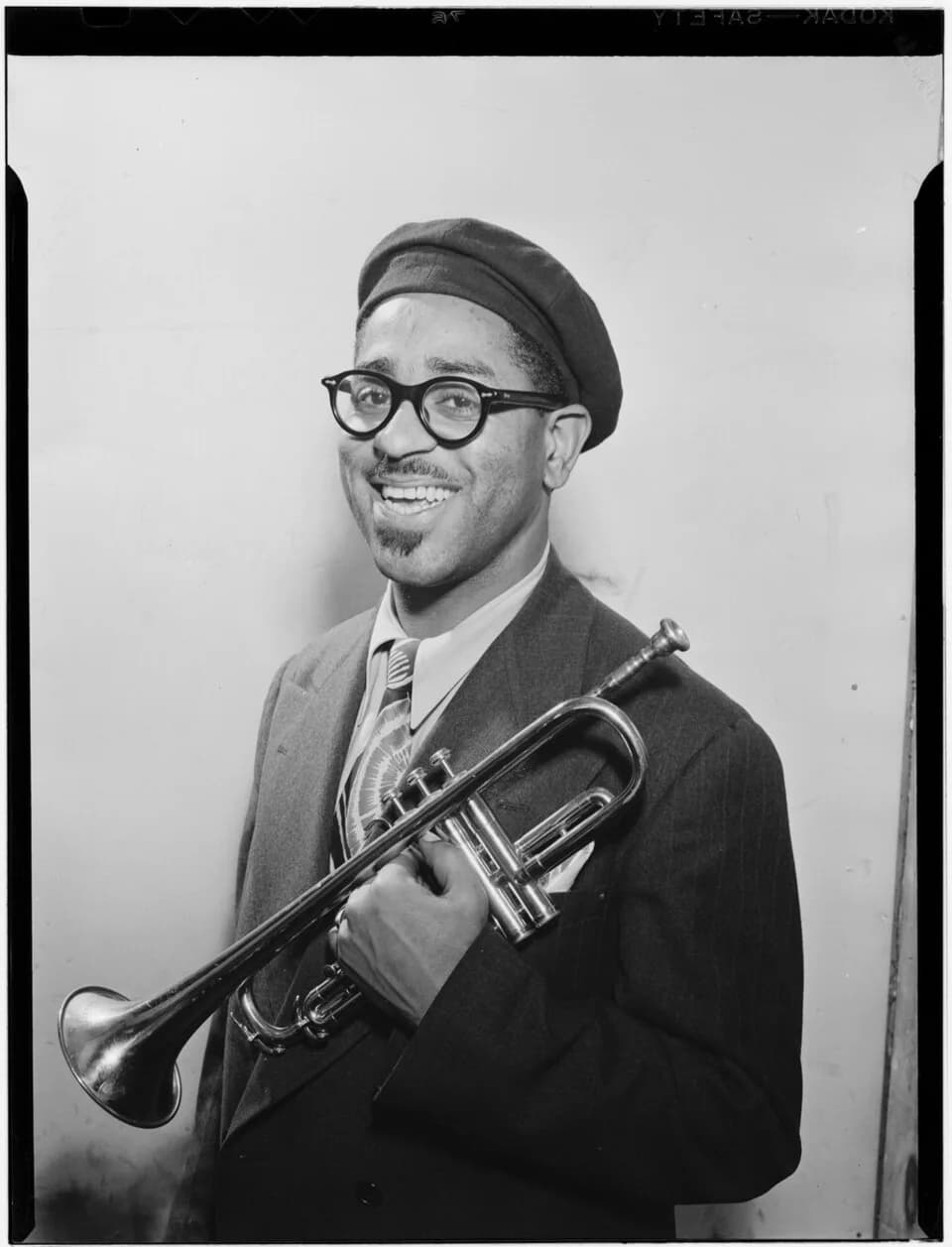Dizzy Gillespie - Gottlieb, William P., 1917-, photographer.
[Portrait of Dizzy Gillespie, New York, N.Y., ca. May 1947]
1 negative :  b&amp;w ; 3 1/4 x 4 1/4 in.
Notes:
 Gottlieb Collection Assignmen