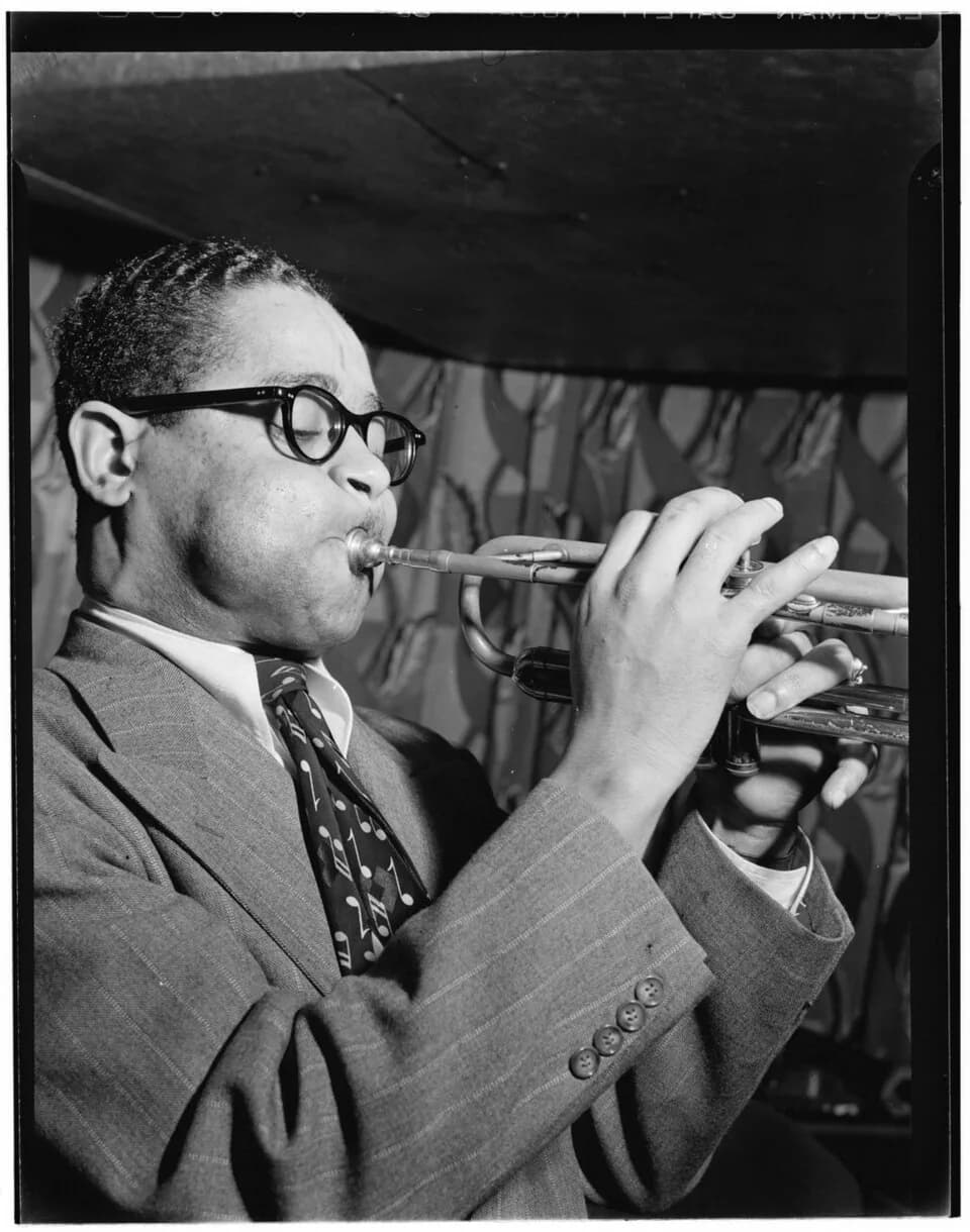 Dizzy Gillespie - Gottlieb, William P., 1917-, photographer.
[Portrait of Dizzy Gillespie, Famous Door, New York, N.Y., ca. June 1946]
1 negative :  b&amp;w ; 3 1/4 x 4 1/4 in.
Caption from Down Beat: