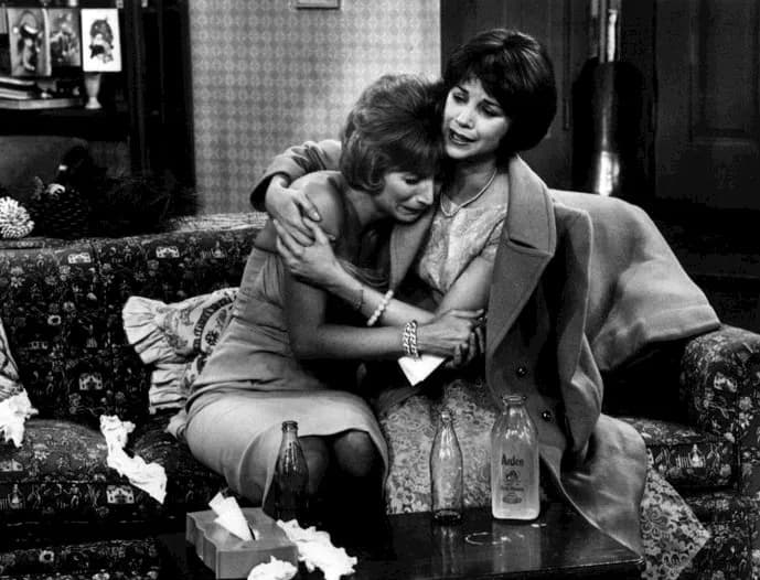 Penny Marshall - Publicity photo of Penny Marshall and Cindy Williams from Laverne &amp; Shirley.  In this episode, an ailing Shirley comforts Laverne when her New Year's Eve date dumps her.
