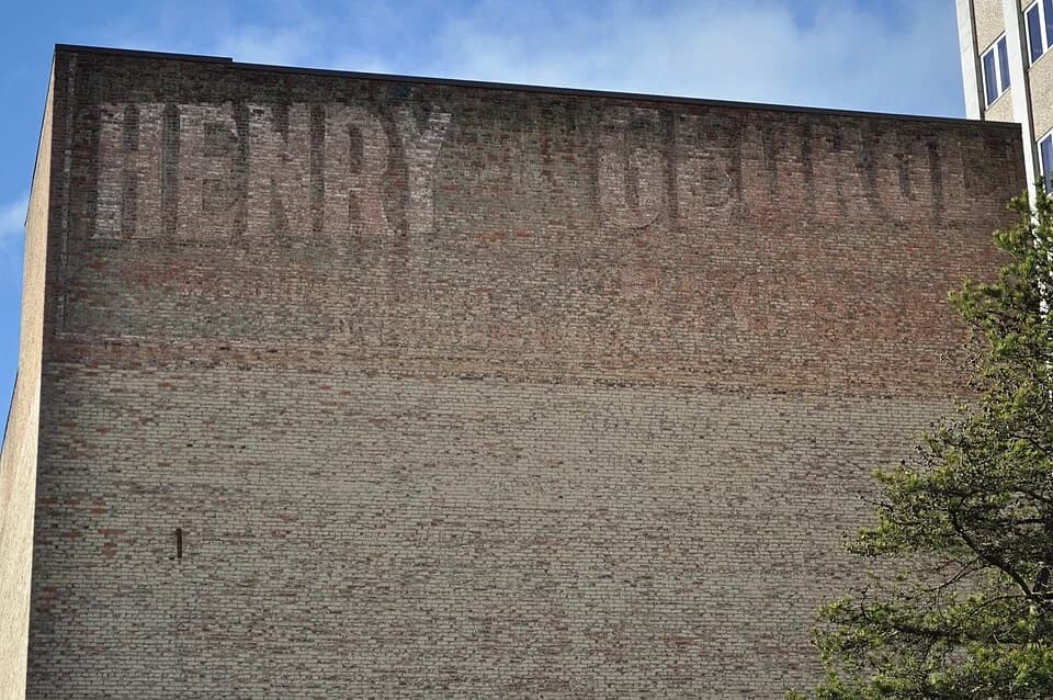 Henry George - Rear of the Everett Theatre, Everett, Washington. (Exterior.) Opened 1901 as an opera house; gutted by fire 1923, rebuilt 1924; remodeled 1952 and 1979 (the latter as a triplex movie th