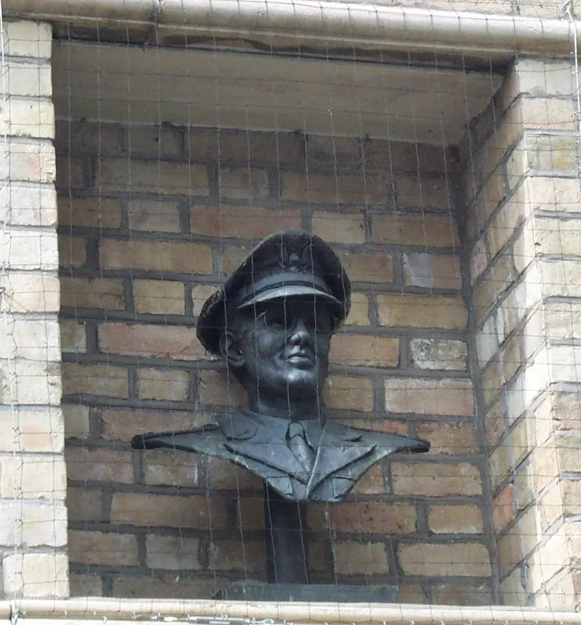 Glenn Miller - Bronze bust of Glenn Miller in an alcove on the front of the Corn Exchange in Bedford, England, where he once performed.  There is a plaque beneath.