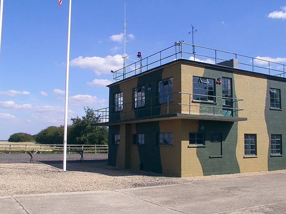 Glenn Miller - RAF Twinwood Control Tower restored in 2002 it contains a tribute to Major Alton Glenn Miller who took his final flight from here on the 15th December 1944.

Photograph taken by Milborn