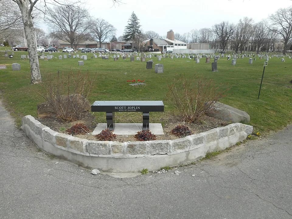 Scott Joplin - The grave of legendary ragtime musician Scott Joplin at the St. Michael's Cemetery in the East Elmhurst and Woodside sections of Queens, New York City. It actually looks more like a ben