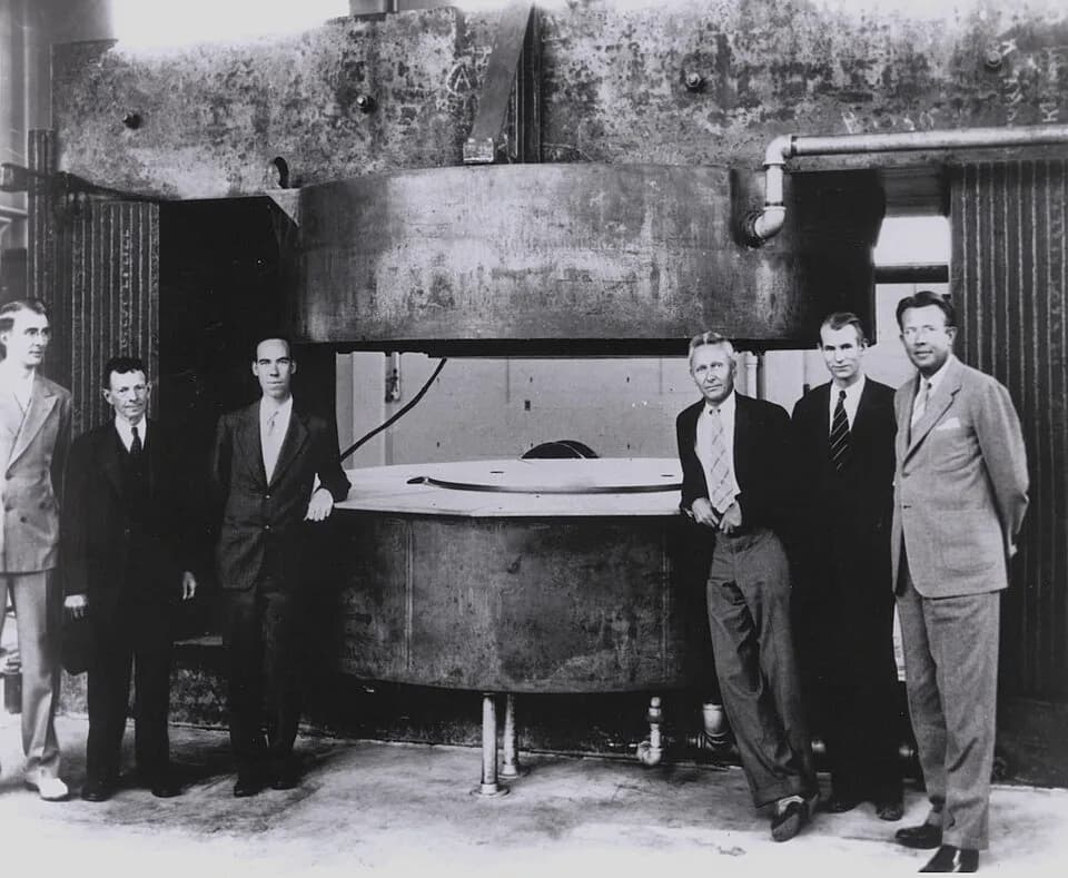 Edwin McMillan - The 60-inch cyclotron at the U of California's Lawrence Radiation Lab soon after its completion in mid-1939.Key figures in the development of the cyclotron.  Left to right: Dr. Luis W
