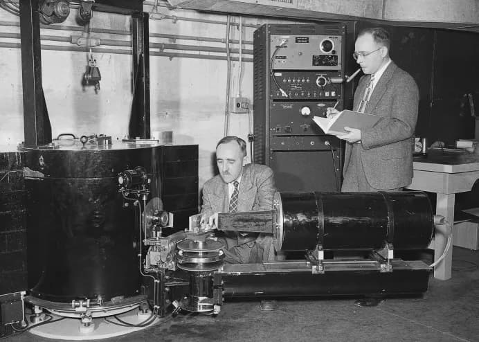 Clifford Shull - Ernest Wollan and Clifford Shull taking data on a double-crystal neutron spectrometer, installed on the south face of the ORNL graphite reactor in 1949.