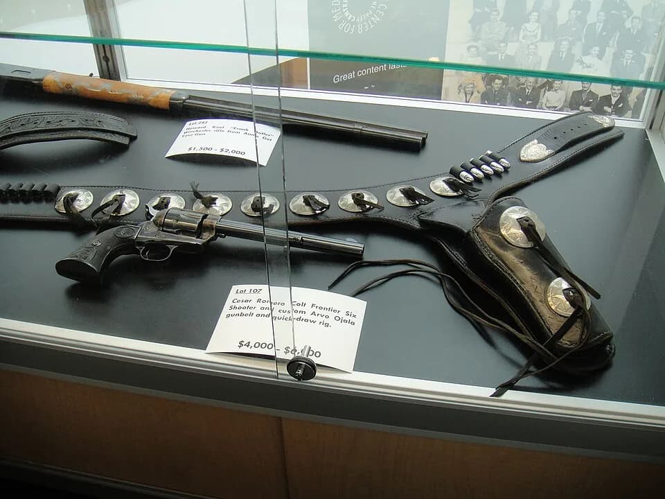 Cesar Romero - Cesar Romero Colt Frontier Six Shooter and custom Arvo Ojala gunbelt and quick-draw rig at the Debbie Reynolds Auction Breaks Up Historic Hollywood Collection (The Paley Center for Medi