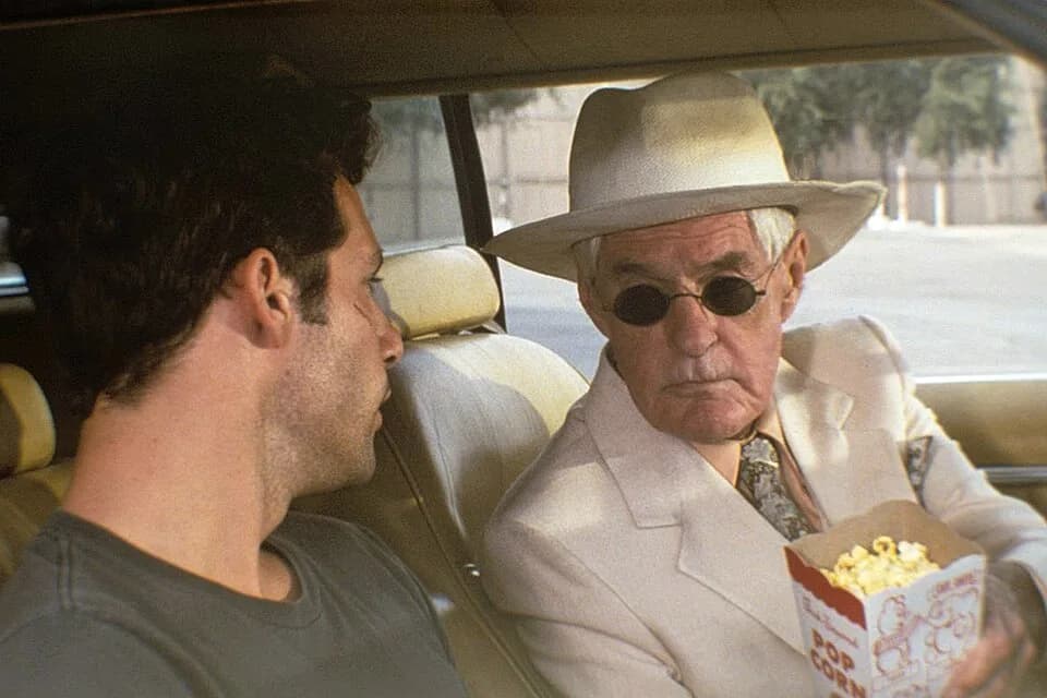 Timothy Leary - Max Parrish as Eli Bud Fritz and Timothy Leary as Mr. Jones in Hold Me, Thrill Me, Kiss Me, 1992