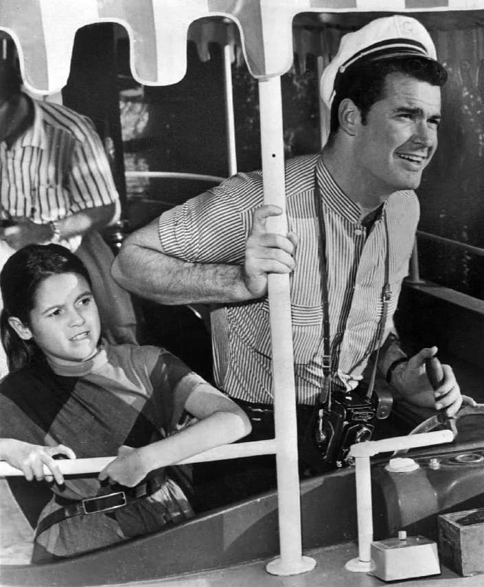James Garner - Publicity photo of James Garner and his daughter, Kim.  The photo was apparently released by ABC as a "family" publicity photo, since they are on a boat wearing modern clothing and Garn