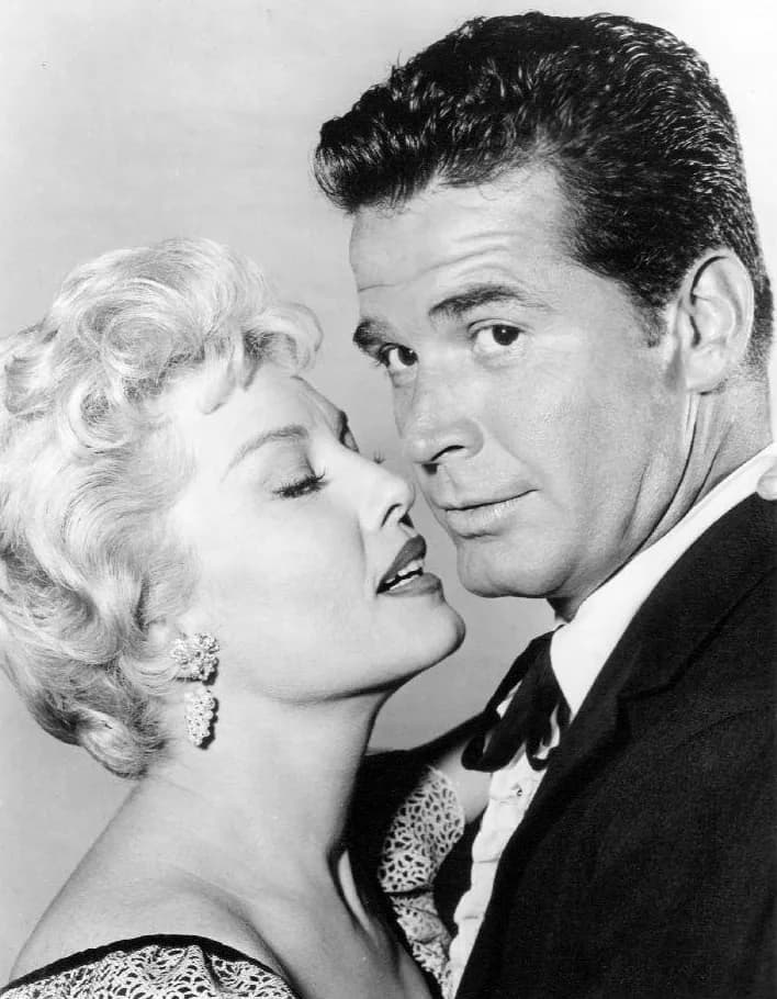 James Garner - Photo of James Garner as Bret Maverick and Jeanne Willes from the television program Maverick.  This episode is "Full House" and aired April 3, 1960.