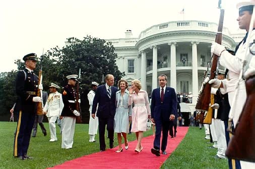 Pat Nixon - Gerald and Betty Ford escort Richard and Pat Nixon from the White House to a waiting helicopter on August 9, 1974, following Nixon's resignation from the presidency.