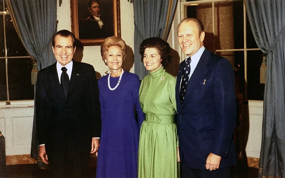 Pat Nixon - President and Mrs. Richard M. Nixon with Representative and Mrs. Gerald R. Ford in the Blue Room following the nomination of Gerald Ford as the President's choice to succeed Spiro T. Agnew