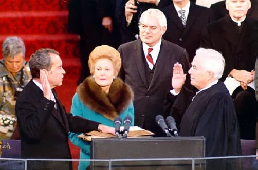 Pat Nixon - President Richard Nixon is sworn in for a second term as First Lady Pat Nixon holds the Bibles at the East Front of the Capitol in Washington, D.C.  Chief Justice Warren Burger administers
