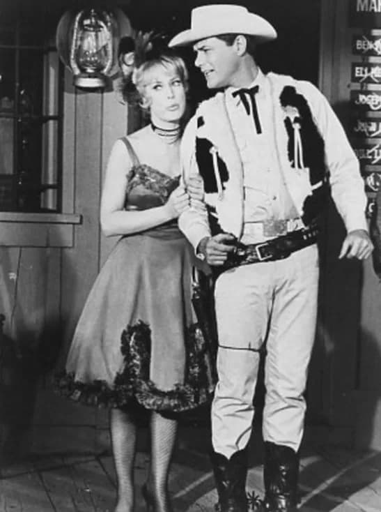 Larry Hagman - Publicity photo of Barbara Eden and Larry Hagman from I Dream of Jeannie "Fastest Gun in the East" 1966 episode. When Tony wishes for the days of the Old West, Jeannie grants his wish b