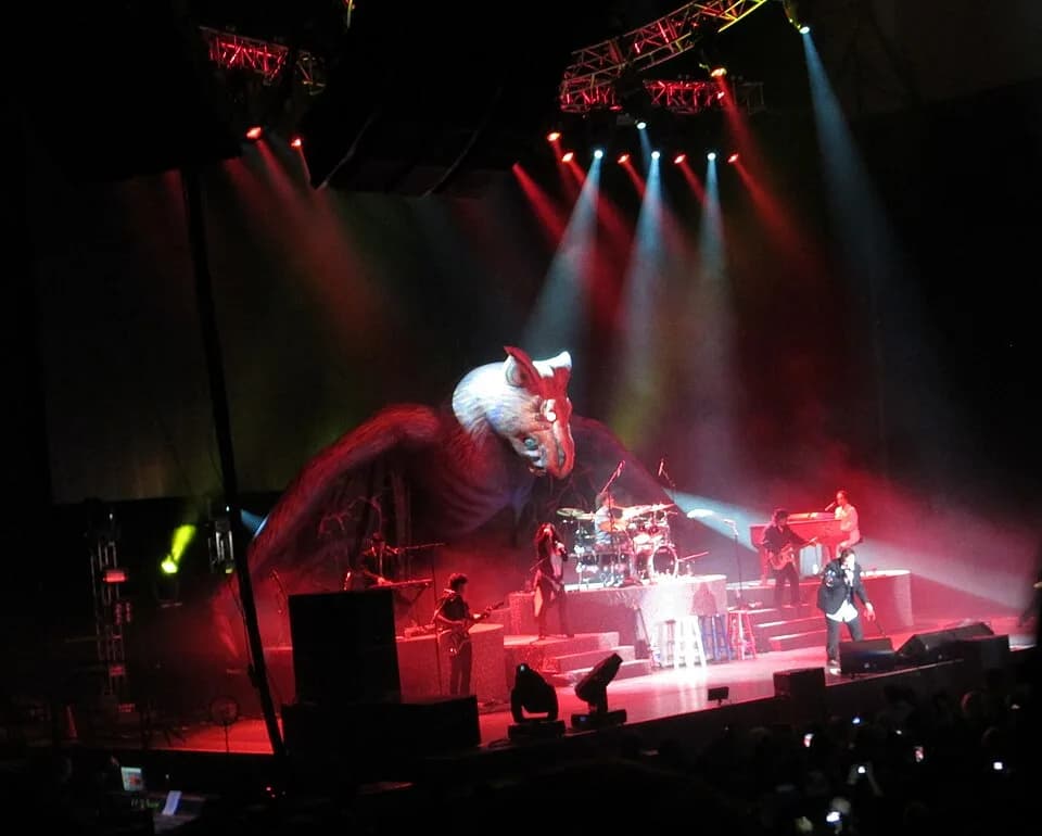 Meat Loaf - Meat Loaf and band performing during the opening night of the Last at Bat Tour in Newcastle upon Tyne's Metro Radio Arena on 5 April 2013. An inflatable bat is on stage during the renditio