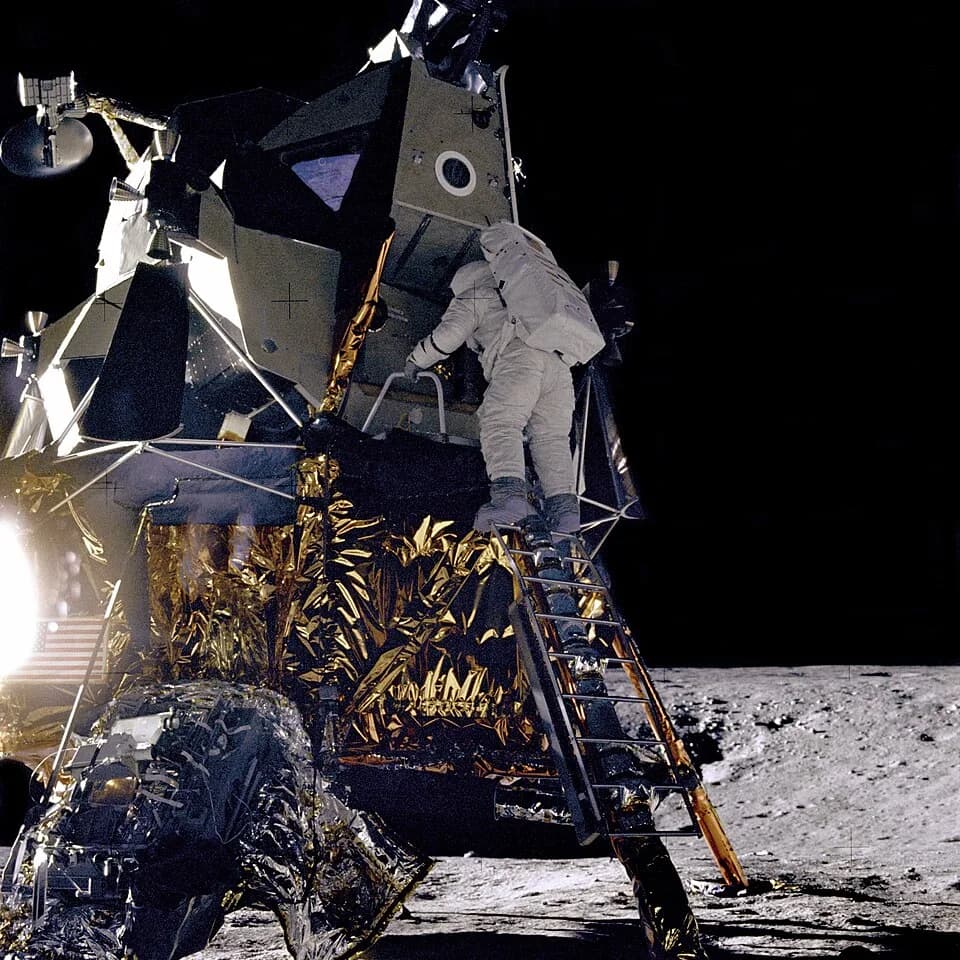 Alan Bean - Alan L. Bean, Lunar Module pilot for the Apollo 12 mission, starts down the ladder of the Lunar Module (LM) "Intrepid" to join astronaut Charles Conrad, Jr., mission Commander, on the luna