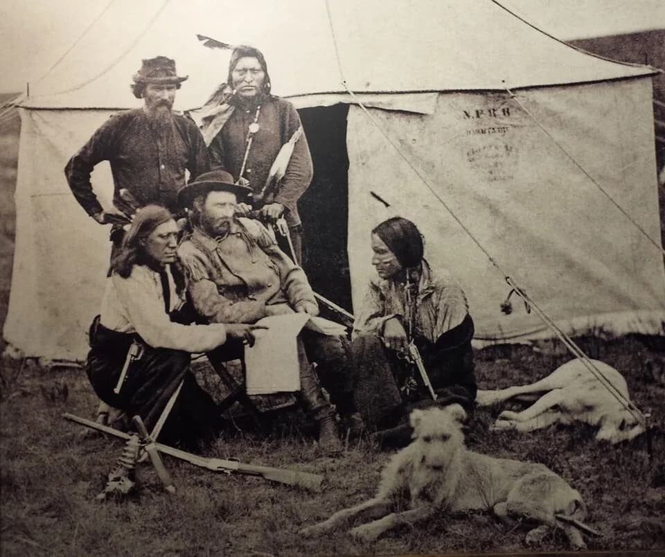 George Armstrong Custer - General Custer, Staghounds in the foreground. Top left to Right:John Burkman (Orderly); Goose [Scout] Bottom Left to right: Bloody Knife; Little Sioux see [1]