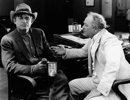 Will Rogers - Will Rogers (left) and Nick Cogley in Honest Hutch (1920) - cropped screenshot.