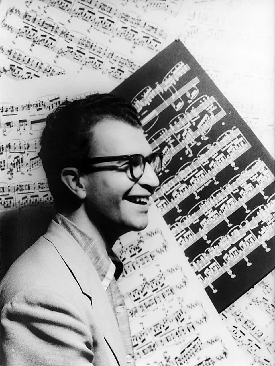 Dave Brubeck - Portrait of Dave Brubeck, with sheet music as backdrop.