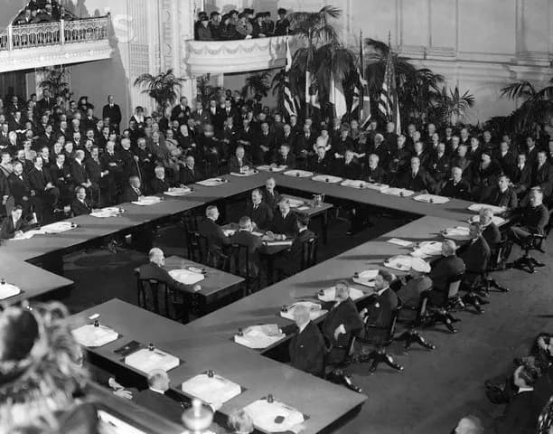 Elihu Root - The first official photograph of the Conference on Limitation of Armaments, at the opening of the third Plenary session in the Headquarters of the D.A.R. is shown. Seated at the head of t
