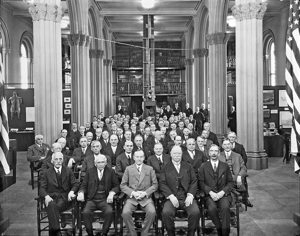 Frank B. Kellogg - Gathering in the Great Hall of fifty leaders of the scientific, political and industrial life of the country at a conference held at the Smithsonian Institution in February, 1927. 
