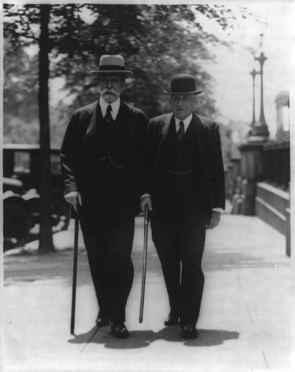 Frank B. Kellogg - Title: Charles Evans Hughes, 1862-1948, (as former Secretary of State), full-length portrait, walking with Secretary of State, Frank B. Kellogg, near the State Department
Abstract/m