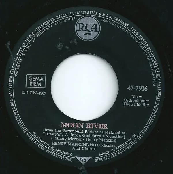 Henry Mancini - Vinyl 7" Single of song "Moon River" composed by Henry Mancini with lyrics by Johnny Mercer. It was originally performed by Audrey Hepburn in the 1961 movie "Breakfast at Tiffany's".