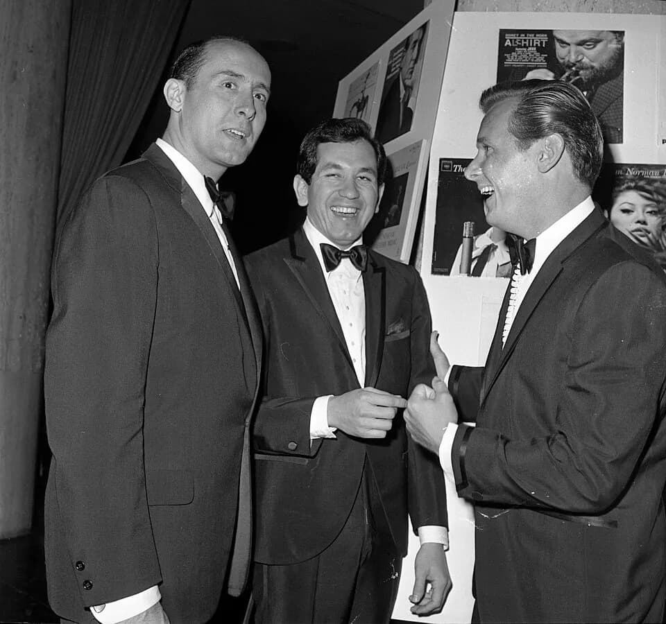 Henry Mancini - GRAMMY AWARDS—Henry Mancini, left, was a triple winner at the Grammy awards dinner of the National Academy of Recording Arts &amp; Sciences at the Beverly Hilton. Trini Lopez, center, 