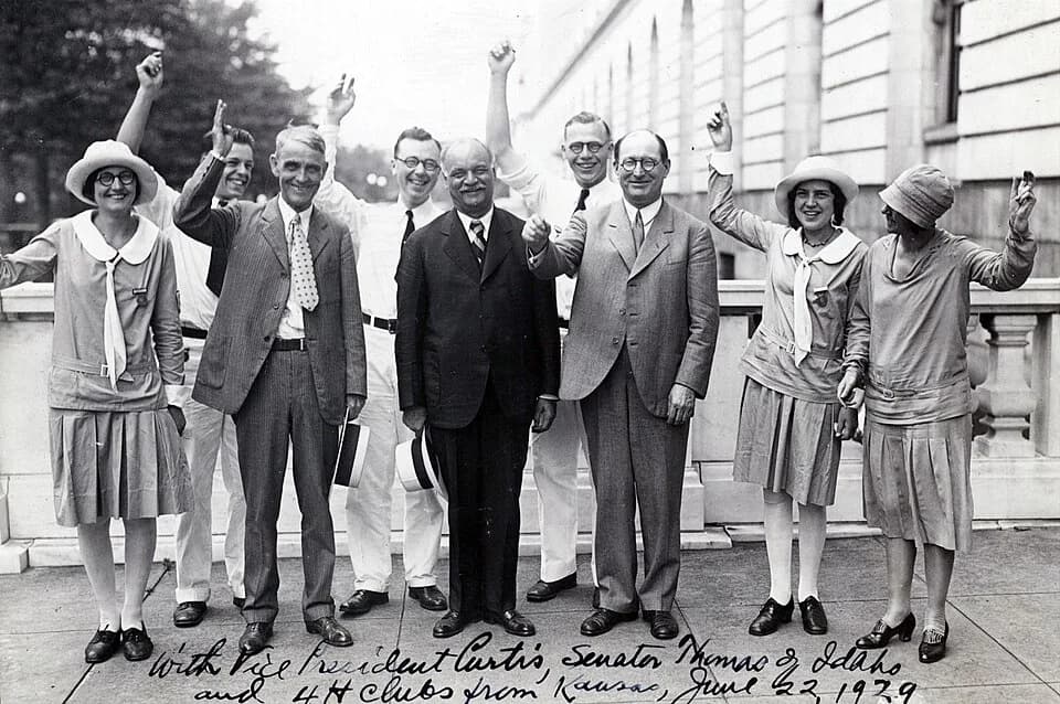 Charles Curtis - US Senator Arthur Capper of Kansas (2nd from left), with US Vice-President Charles Curtis (front row, center left) and US Senator John W. Thomas of Idaho (front row, center right) wit