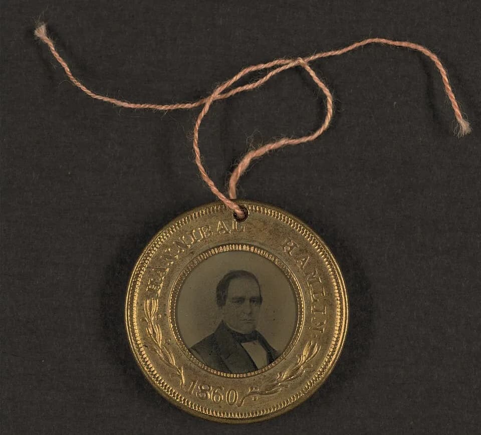 Hannibal Hamlin - Campaign button for Hannibal Hamlin, 1860.  Portrait appears in tintype.  Hannibal Hamlin was vice presidential running mate to Abraham Lincoln, whose portrait appears on the other s