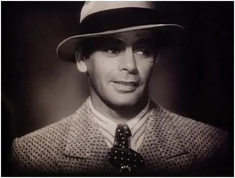 Paul Muni - Cropped screenshot from the trailer for the 1932 film Scarface.