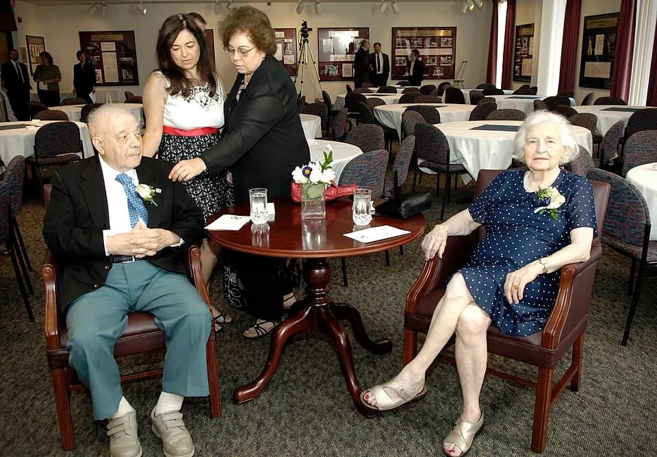 Jerome Karle - Daughters Louise Karle Hanson, center and Madeleine Karle ready their parents, Drs. Jerome and Isabella Karle, for their retirement from the Naval Research Laboratory (NRL) following a 
