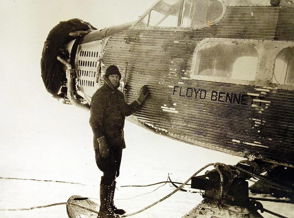 Richard E. Byrd - Commander Richard E. Byrd’s First Antarctic Expedition, 1928-1930. With the Byrd Expedition in Antarctica. Elbert J. Thawley, engineer of the “Eleanor Bolling” standing beside the fu
