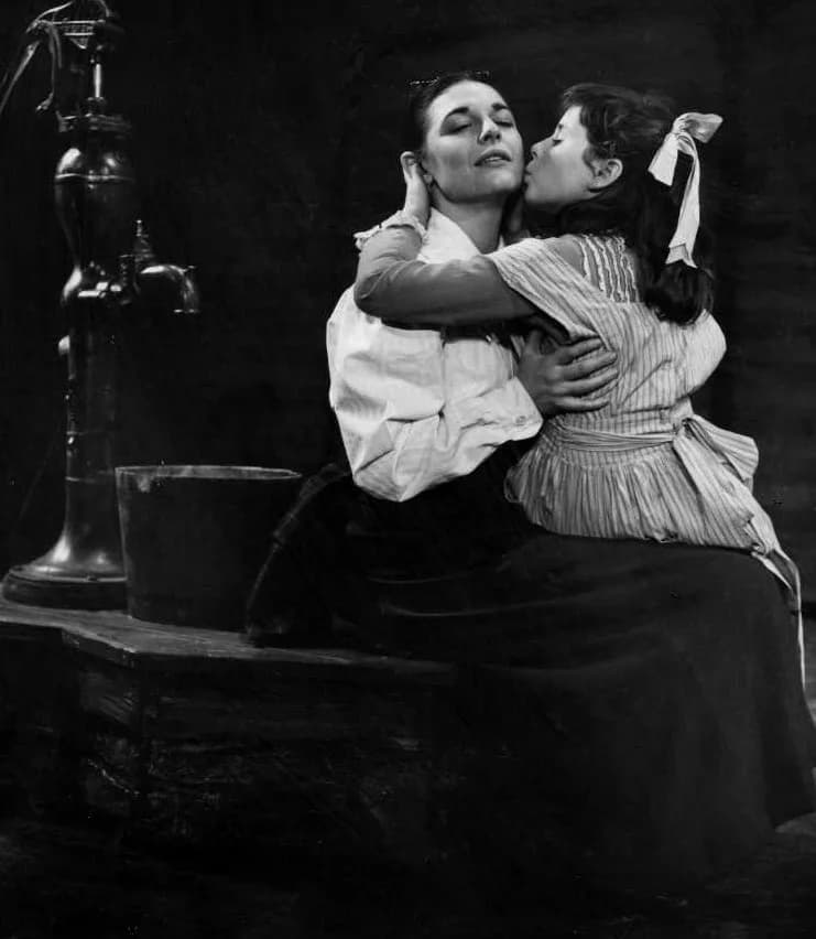 Patty Duke - Photo of Anne Bancroft as Annie Sullivan and Patty Duke as Helen Keller from the Broadway play The Miracle Worker.  In this scene. Miss Sullivan has finally made a connection with Helen. 