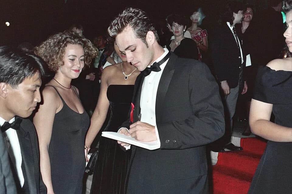 Luke Perry - Luke Perry signs an autograph at the 1991 Emmy Awards.
NOTE:  Permission granted to copy, publish, broadcast or post any of my photos, but please credit "photo by Alan Light" if you can. 