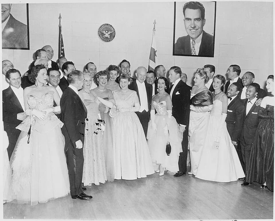 Mamie Eisenhower - Photograph of President Dwight D. Eisenhower and his wife Mamie with other guests at the Inaugural ball. - NARA - 200426.jpg