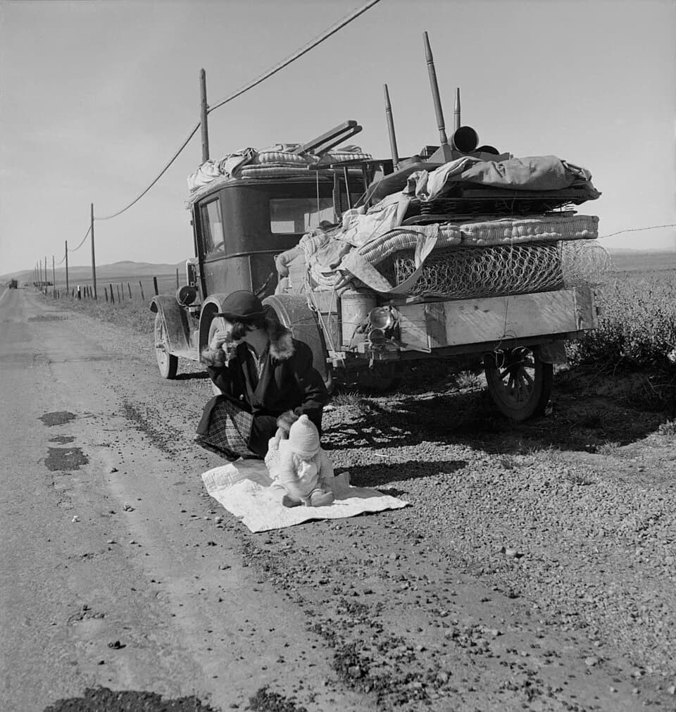 Dorothea Lange - Tracy (vicinity), California. Missouri family of five who are seven months from the drought area on U.S. Highway 99. "Broke, baby sick, and car trouble!" (LOC description) 
N.B.: The 
