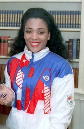 Florence Griffith Joyner - C50027-6, President Reagan greeting Florence Griffith Joyner of the U.S. Olympic team in the oval office. 10/24/88.