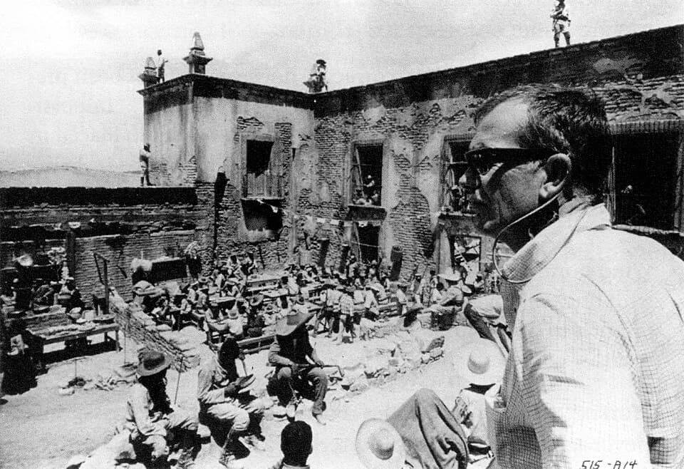 Sam Peckinpah - Production still for the film The Wild Bunch. Director Sam Peckinpah on right.
