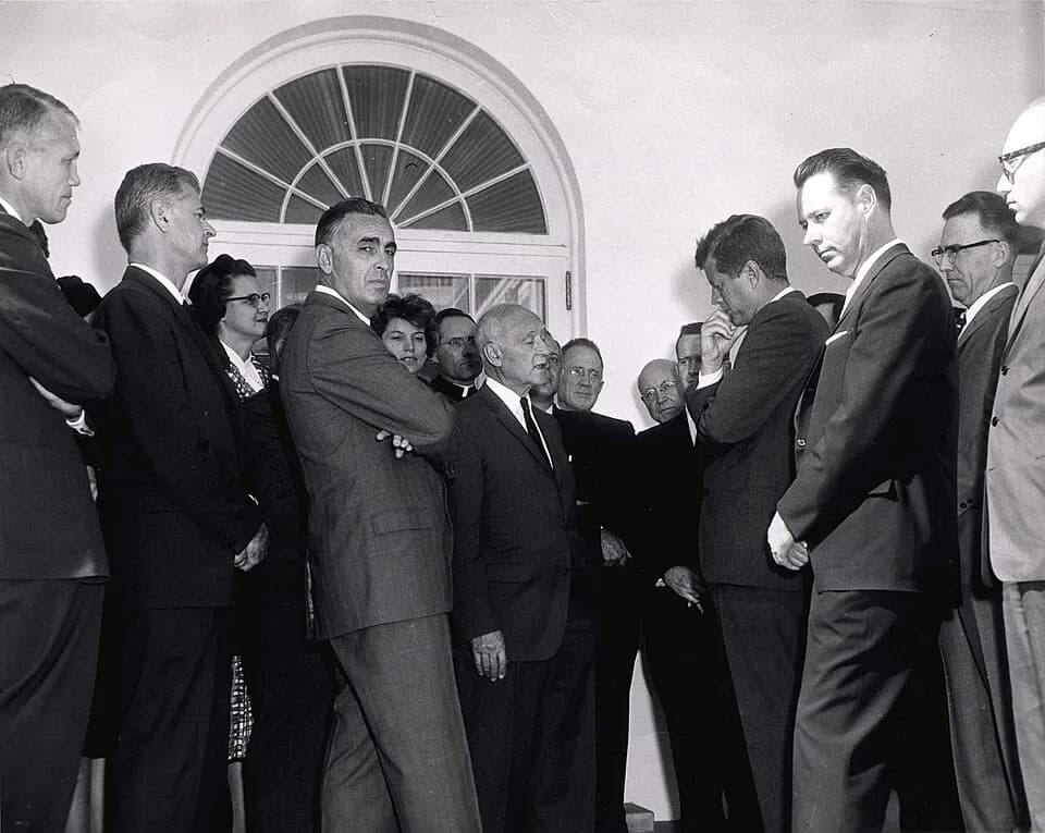 Joshua Lederberg - President John F. Kennedy greets members of the President's Panel on Mental Retardation in the White House Rose Garden on October 18, 1961. Kennedy's family was personally affected 