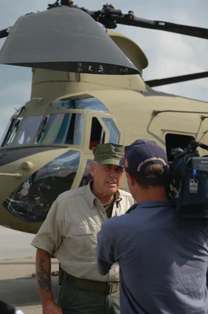 R. Lee Ermey - R. Lee Ermey stands in front of a CH-47F Chinook helicopter for a segment of his show, "Lock and Load." Ermey, best known for his role as a drill instructor in "Full Metal Jacket" and t