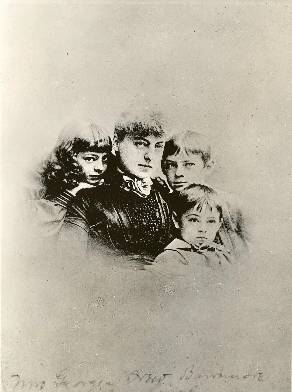 John Barrymore - An undated copy print of an earlier portrait of Georgia Drew Barrymore with her children Ethel (age six), Lionel (age eight), and John (in front, age four). Typed on back: "The Barrym