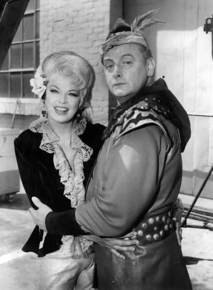 Art Carney - Photo of Art Carney as the Archer and Barbara Nichols from the television program Batman. (Note-seller lists the actress as his wife; Carney was once married to Barbara Isaac, not Nichols