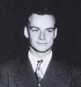 Richard Feynman - Richard Feynman (center) and Robert Oppenheimer (to viewer's right of Feynman) at Los Alamos National Laboratory during the Manhattan Project.   Original source from http://www.lanl.